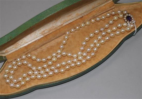 A double strand cultured pearl choker necklace with 9ct gold, amethyst and cultured pearl set oval clasp, 42cm.